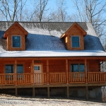 Snow on the Roof of Custom Log Home