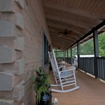 Rockers on Deck of Log Home