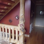 Butterfly and Chipmunk Carving in Log Home