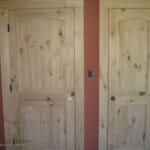 Knotty Pine Doors in Log Home