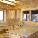 Rustic Retreat Log Cabin Kitchen