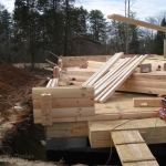 Log Stack and Logs on Subfloor