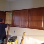 Ron Setting Cabinets