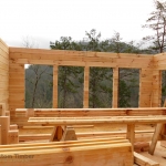 framing-in-log-wall-for-glass