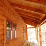 log home porch beams stained