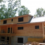 Logs Stacked Shed Dormer On and Metal Roof 2