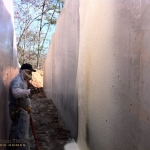 spraying foundation wall
