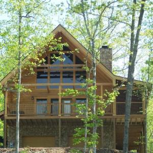 Log Home With Custom Gable Glass