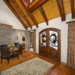 Great Room and Entry Doors by Custom Timber Log Homes