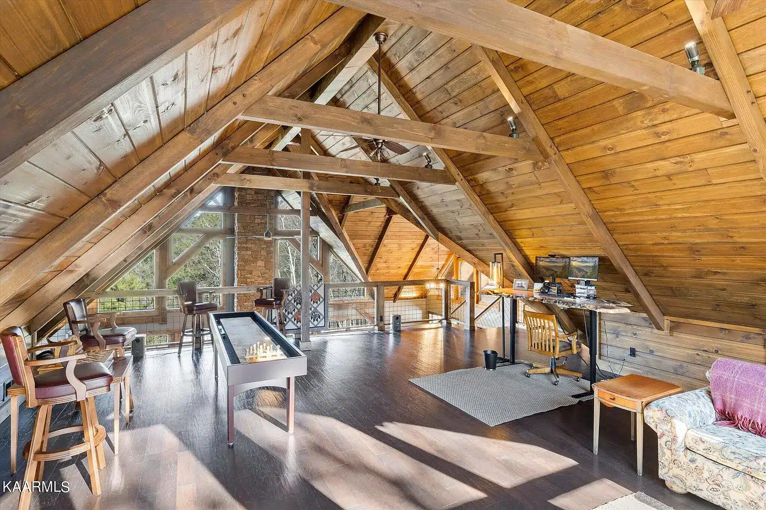Rustic Timber Home Loft With Game Room and Office with Exposed Collar Ties
