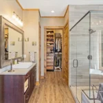 custom walk in shower with hard wood floor and tile shower